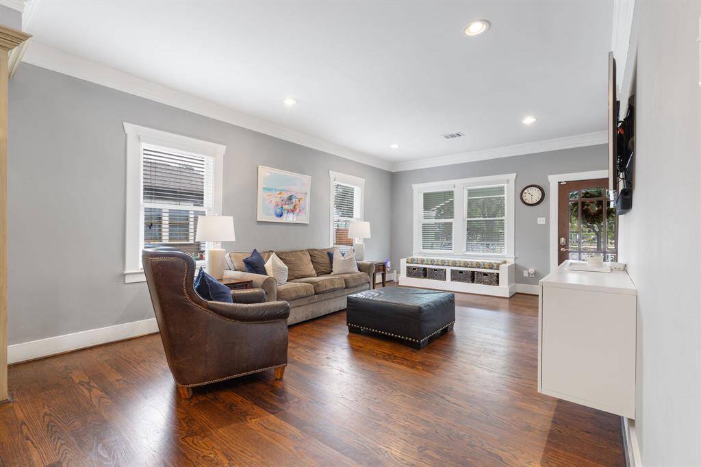 Family room opens to downstairs office and another nice back porch.