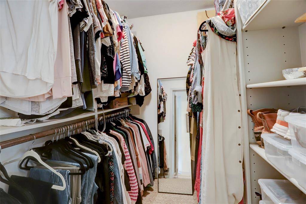 One of two walk-in closets in the primary suite.