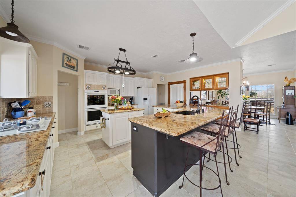 The very unique white appliances bring a very clean look to the kitchen!