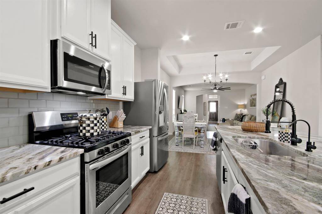 Another view of the beautiful kitchen.