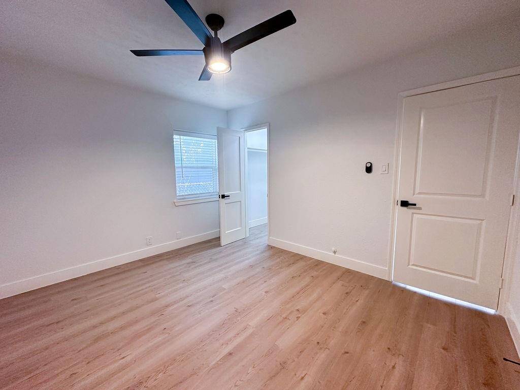 Secondary bedroom offering ample natural light and plenty of space.