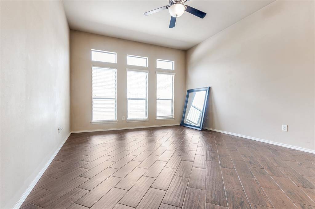 Spacious Master Bedroom with floor to ceiling windows