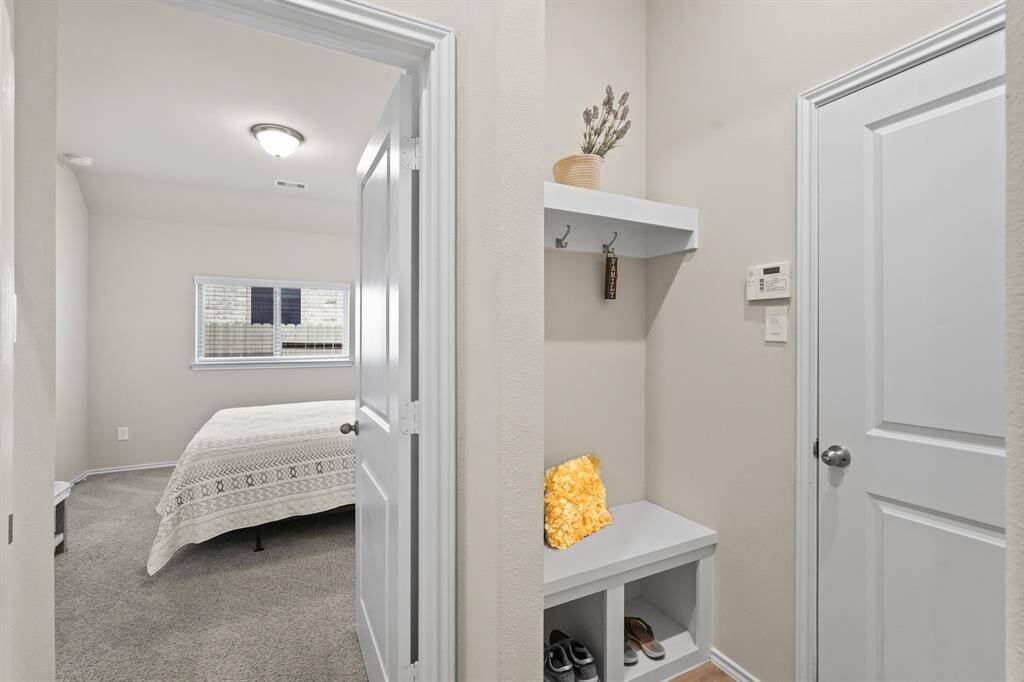 Convenient mudroom from the garage to store jackets and shoes to keep your home nice and tidy.