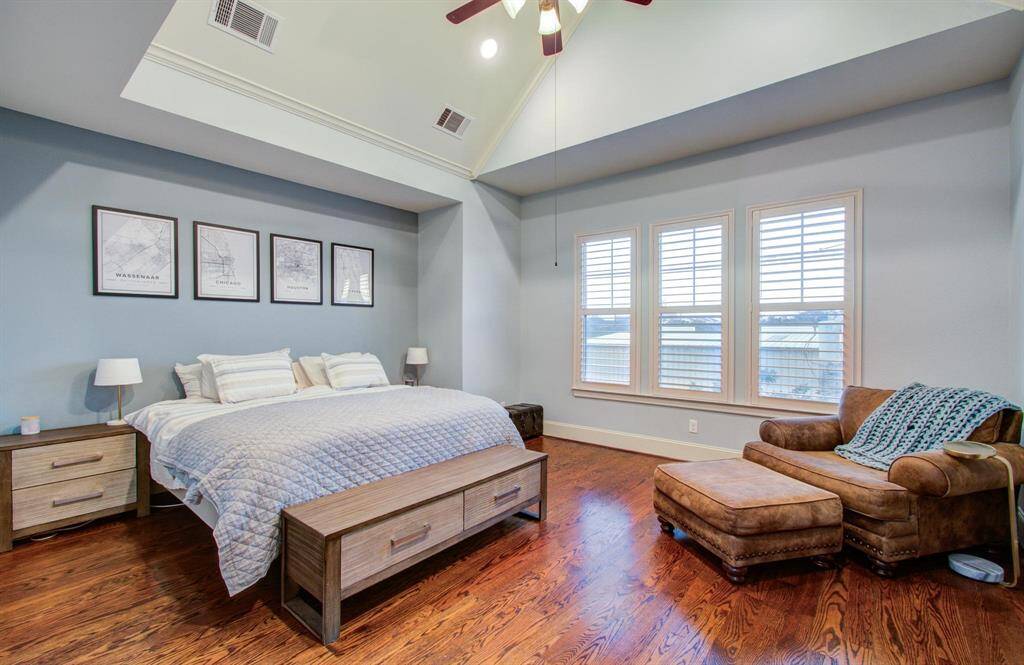 Primary suite with tray ceilings and great natural light