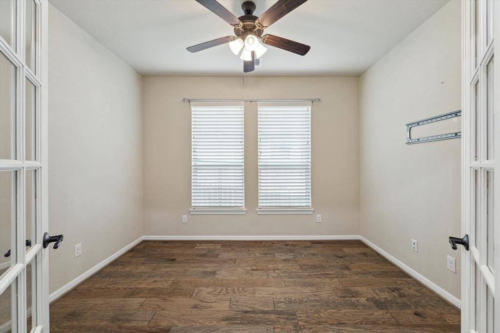 Study has hardwood floors, and can be used as a TV room, workspace, music room or whatever works best for you.  The French doors make the room private.
