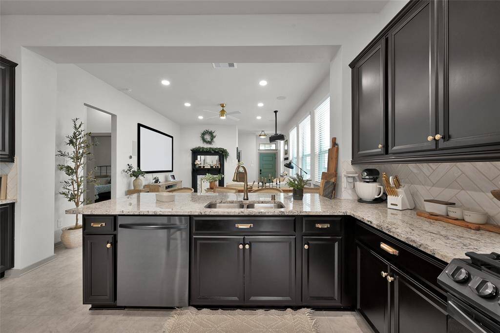 Faucet features a Delta Touch2OTechnology in Champagne Bronze.