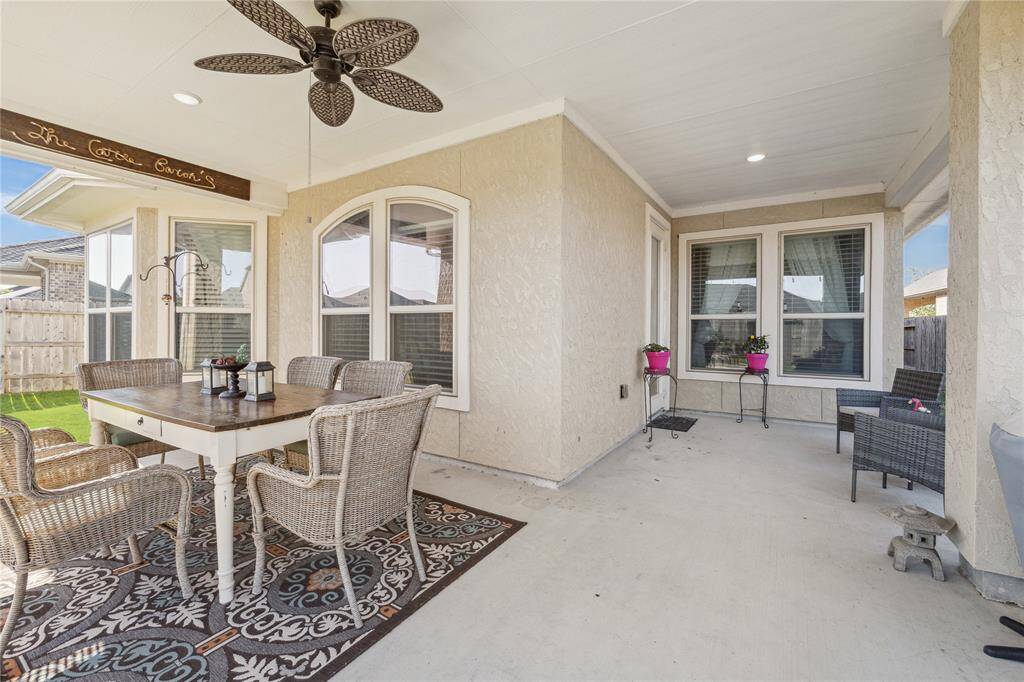 Extended back patio is the perfect place for your first cup of coffee or a great place to entertain.  Recent addition of ceiling fan to keep area cool on summer nights.  There is no afternoon sun in the entire area.
