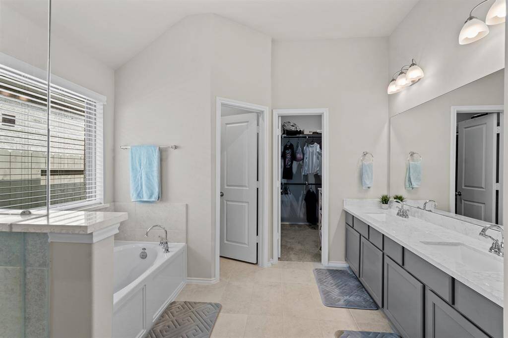 12x11 - Master bathroom with dual vanity sinks provide plenty of space for two