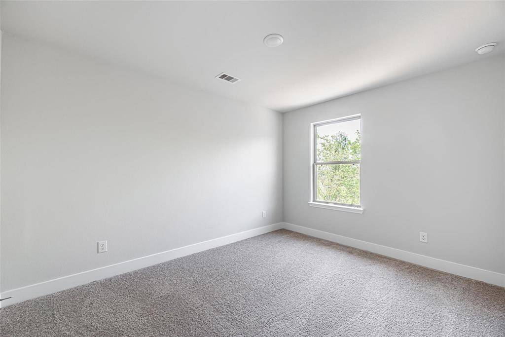 Secondary bedrooms are super spacious and allow plenty of room for large furniture settings.