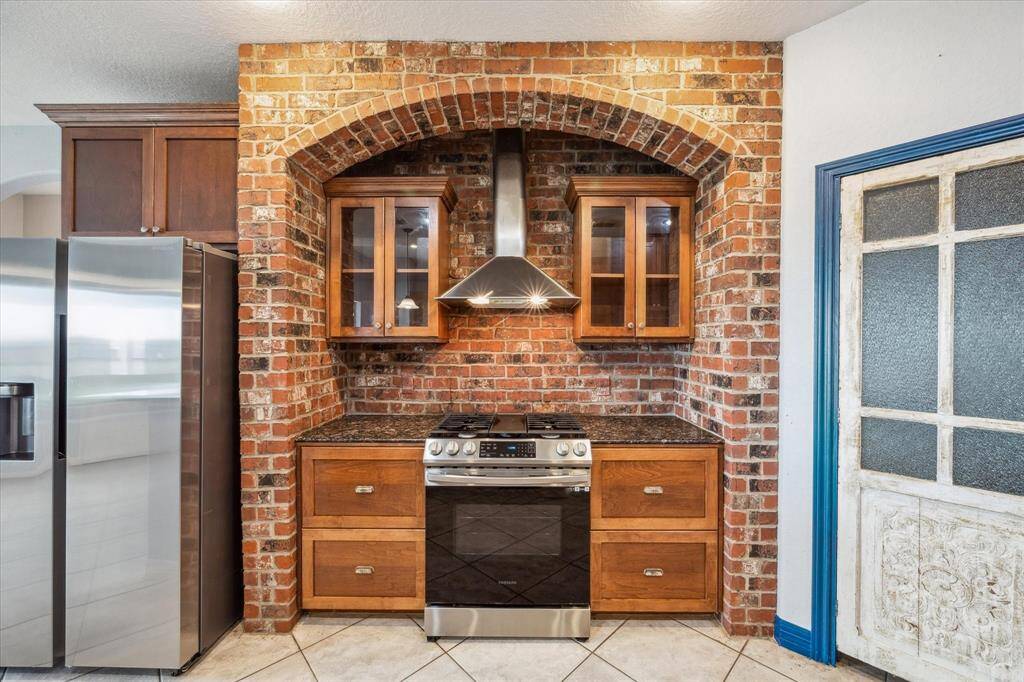 Solid brick wall with gorgeous arch design