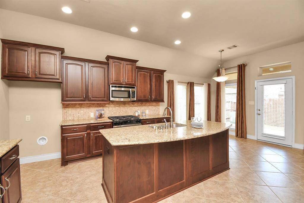 separate island with lots of kitchen storage