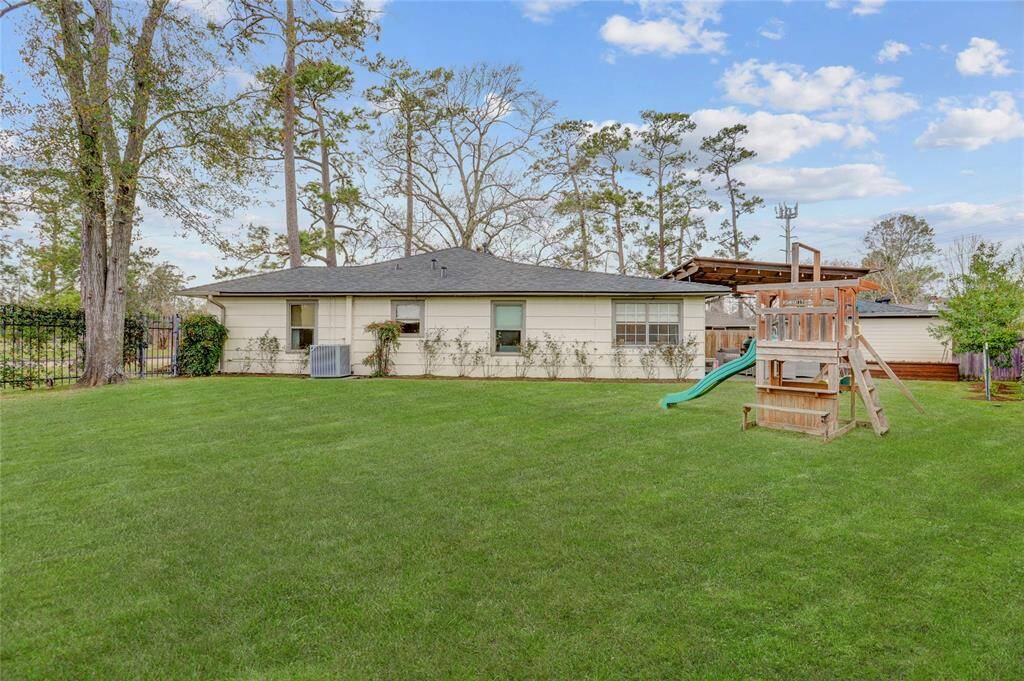 The 11,000 square foot lot offers plenty of room to entertain and play inside of a fully-fenced yard.