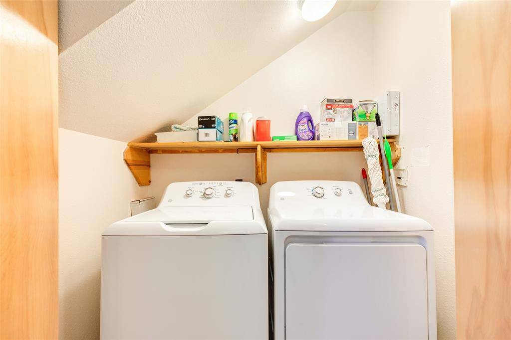 Utility room is conveniently located in the hallway