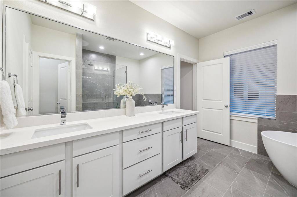 *Not of exact home, photo is of recently completed home in same community with same floor-plan & similar finishes*