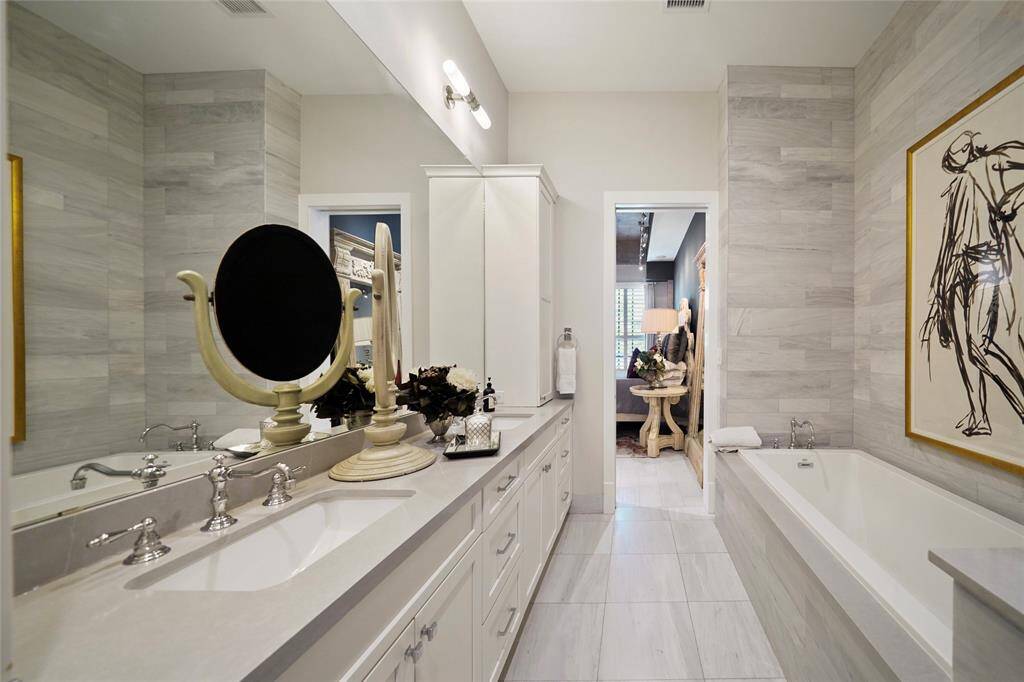 The ensuite bathroom is a serene retreat with all the amenities for relaxation