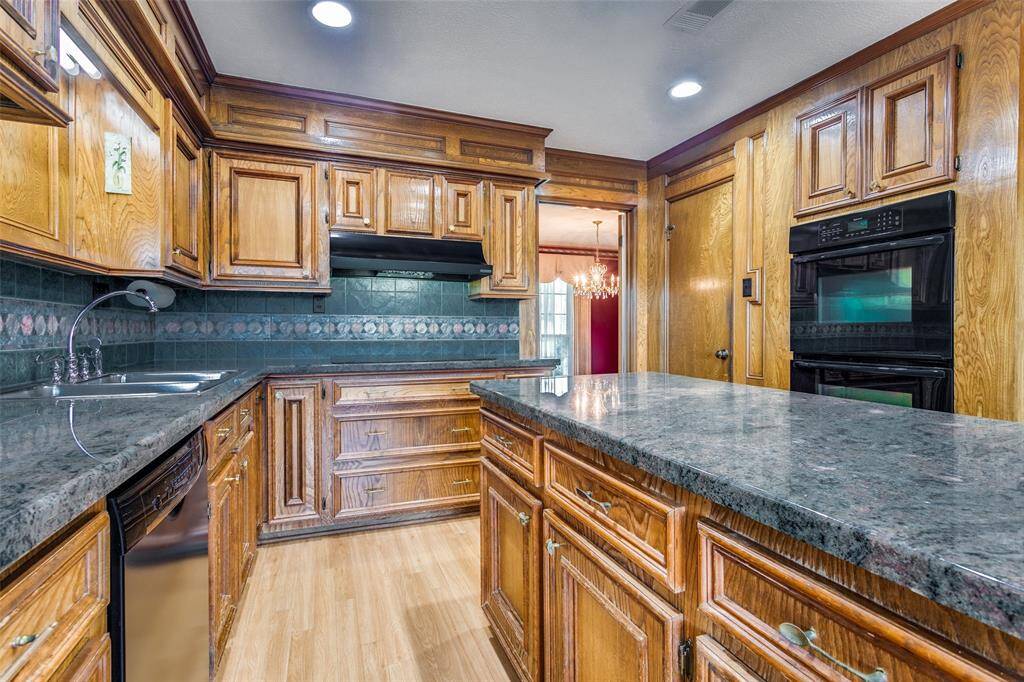 Not only do you have cabinets but you have drawers also - a chef's dream. There is a gas connection if you want to change out the Dacor electric cooktop to gas.