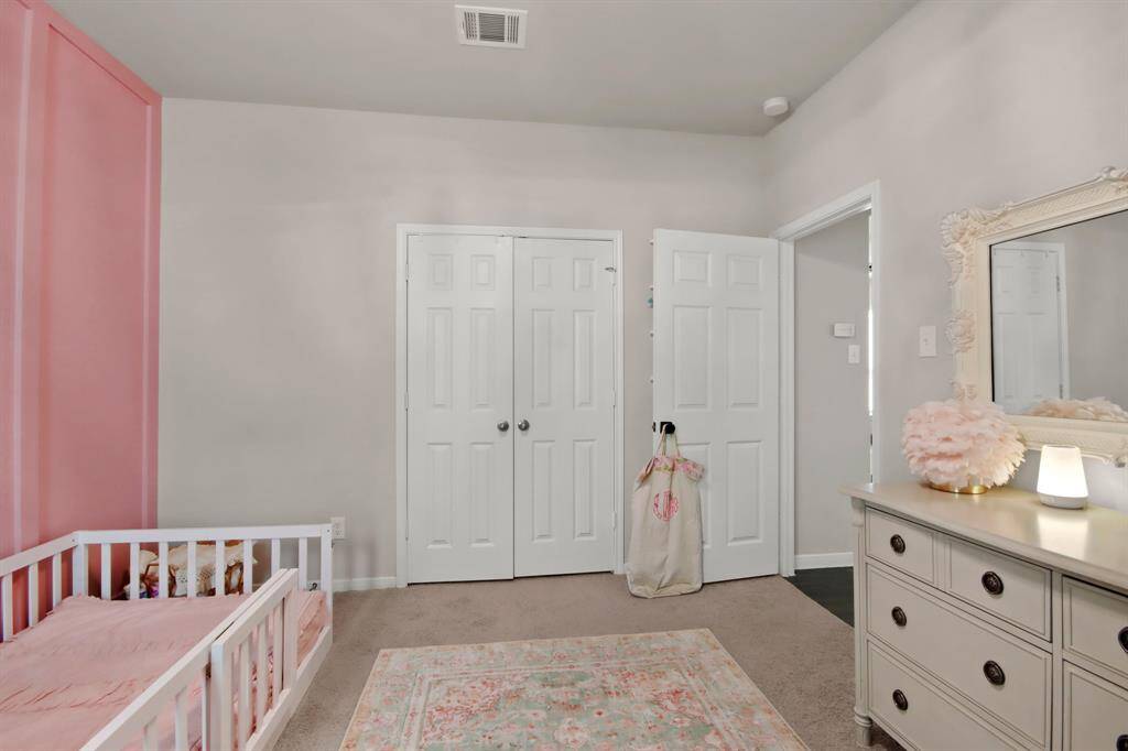 Another view of this beautiful bedroom including a chandelier/ceiling fan with remote, adding comfort & elegance.