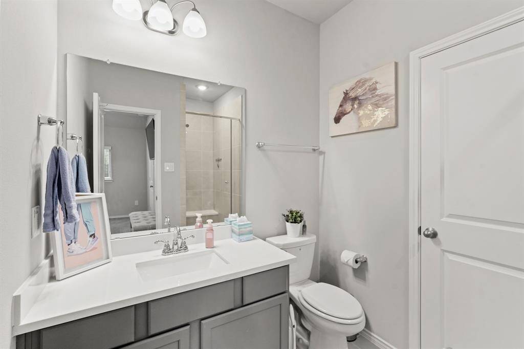 This private, FULL bath is perfect for guests or extended family with an additional linen closet (walk-in shower not pictured)