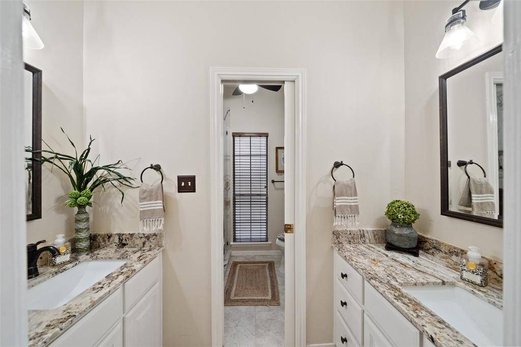 The second bathroom offers two vanities allowing for extra convenience!