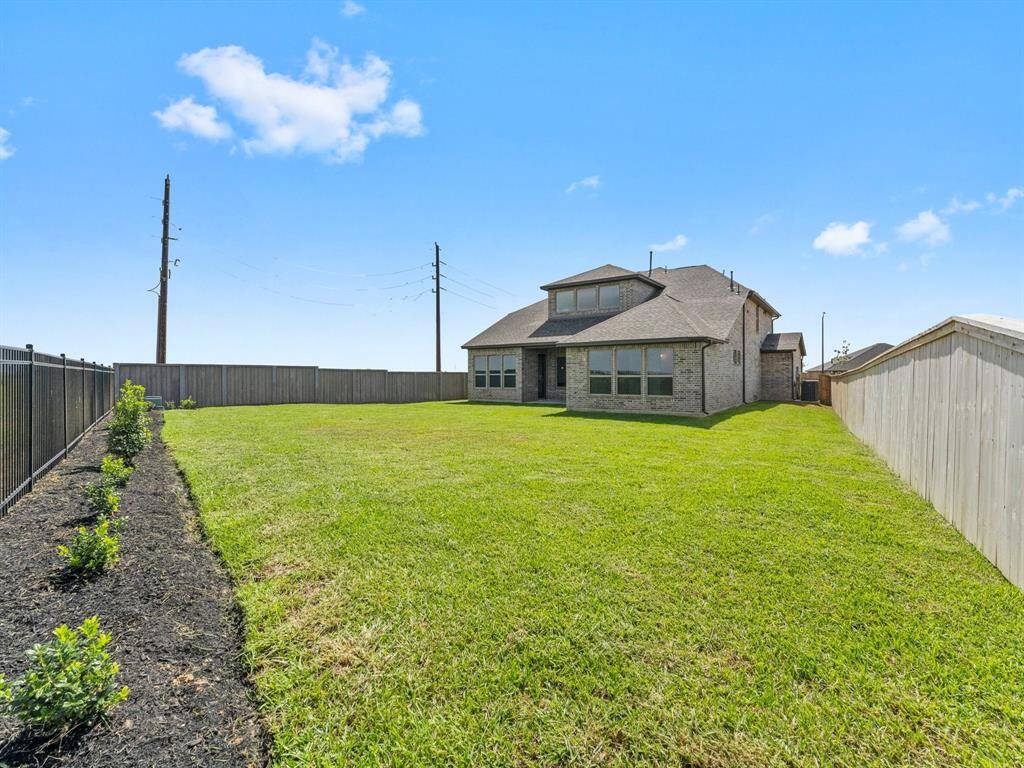 Spacious Back Yard with Full Sprinkler System