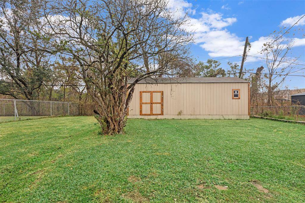 The storage shed provides extra space for all your tools and outdoor essentials.