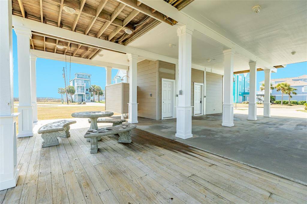Ground level also has wood decking