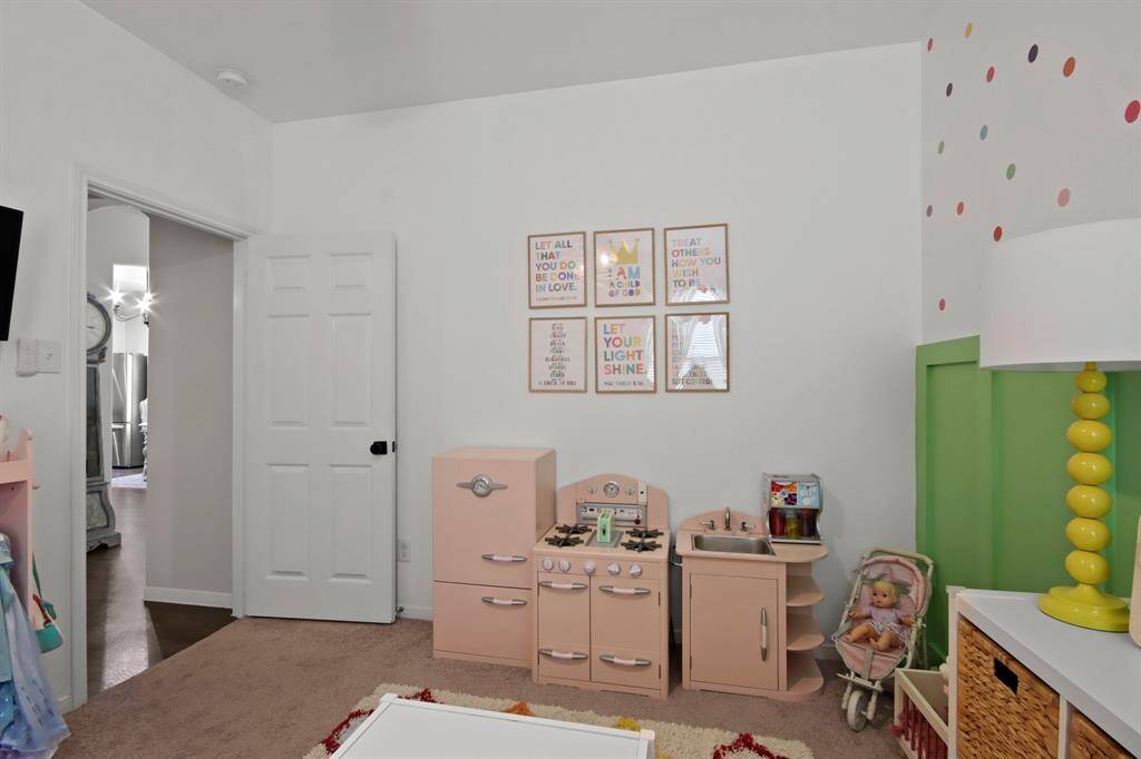 This 2nd bedroom is spacious enough for furniture or plenty of toys.
