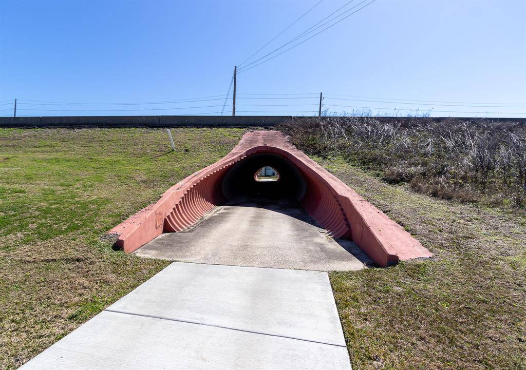 Enjoy the convenience and safety of community tunnel under the highway to the beach! Tunnel is located right by this amazing property!