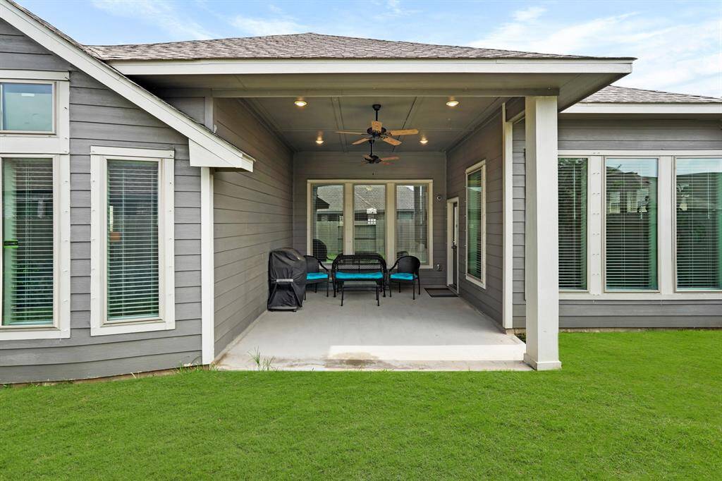 Large covered patio to enjoy sunny afternoons barbecuing and peaceful evenings with family and friends