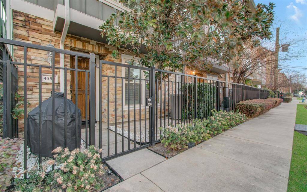 Private fully fenced patio area. No street parking on Eli, making for a very quiet sidewalk to only this row of homes.