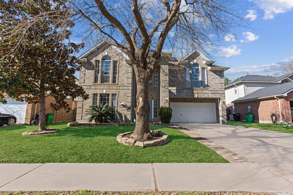 Energy-efficient upgrades include insulated windows, solar panels, a Tesla Powerwall for backup storage, and a Tesla charging station. Plus, the home has been freshly painted inside and out!
