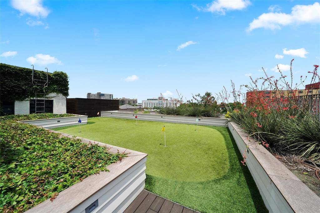 10,000 sqft rooftop oasis featuring a putting green, lush gardens, and amazing views