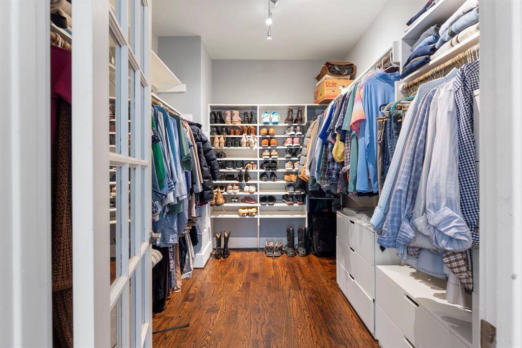 Huge walk in closet in primary bedroom.