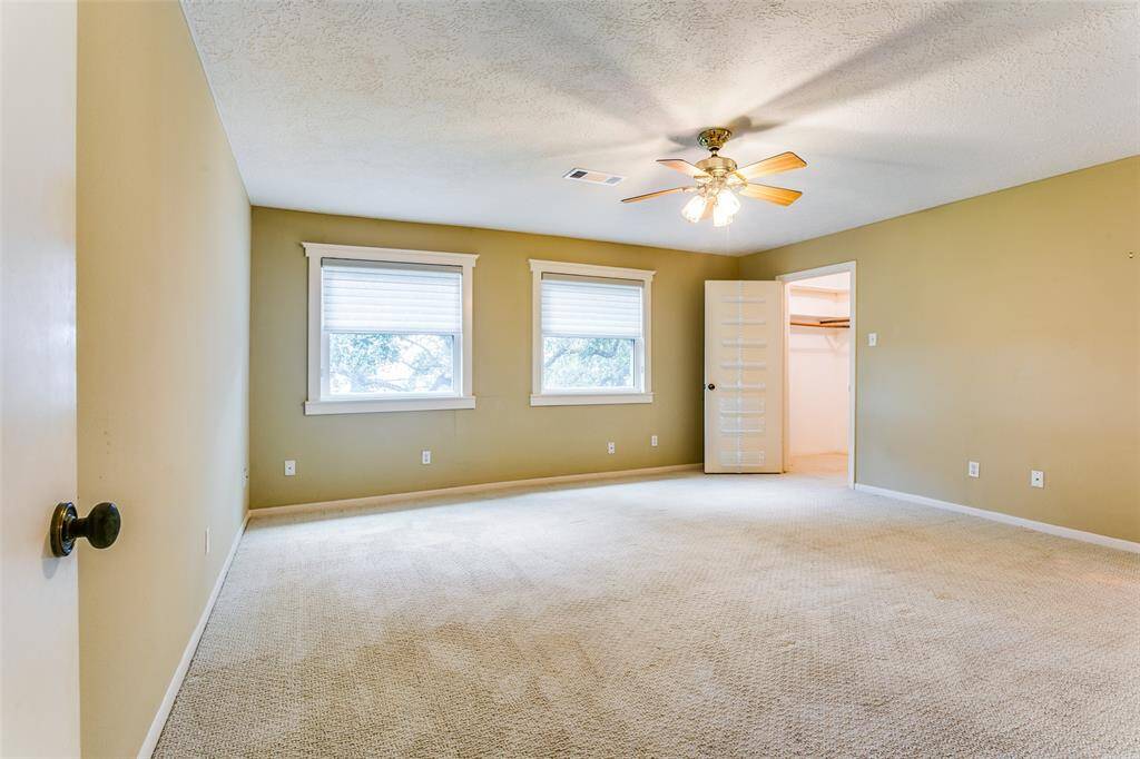 The fourth bedroom has previously been used as a game room. There is a CAT 5 connection from the family room into this room. There is a large walk-in closet and shares a Jack and Jill bathroom.