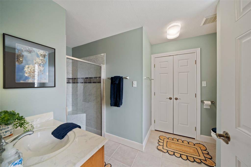 Also, in the guest suite is a large bathroom with a walk in shower!