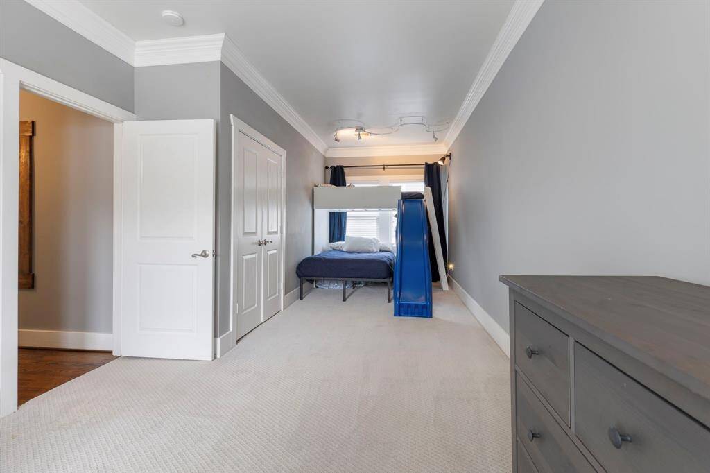 Another view of this big secondary bedroom.