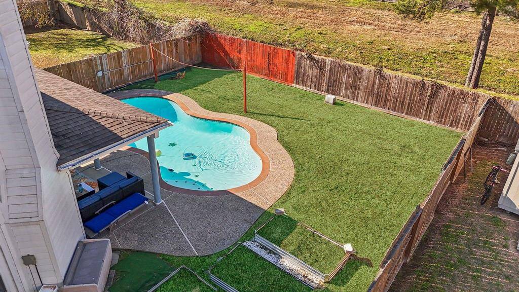A spacious backyard perfect for your furry friends to run and play!