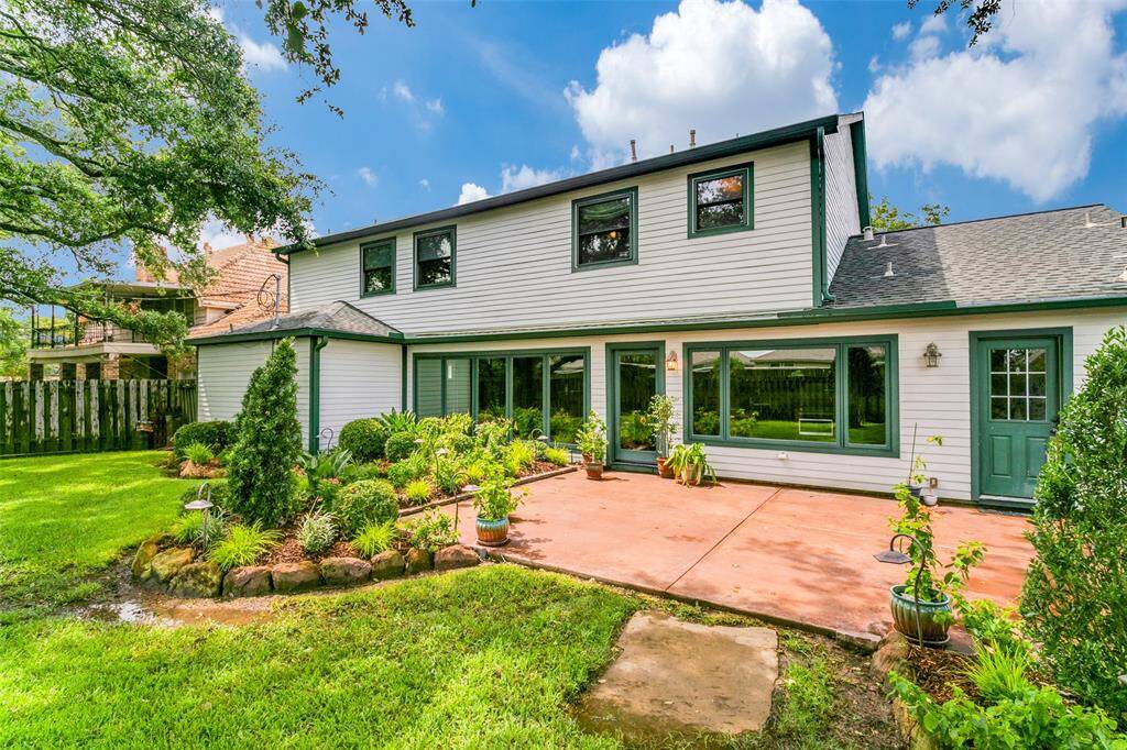 This two story home features a large backyard, with a sizable patio surrounded by well maintained gardens, sustained by a sprinkler system, and mature trees. Included is a new wood privacy fence.
