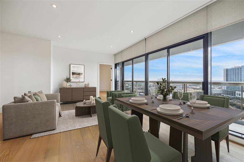 Engineered hardwood floors are throughout the living areas and bedrooms. Window coverings have been installed and all closets fitted out. Virtually Staged.