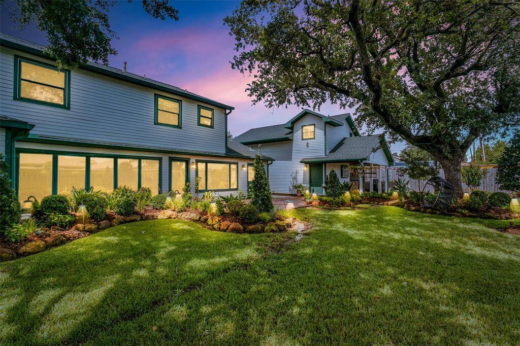The backyard has great landscape lighting.