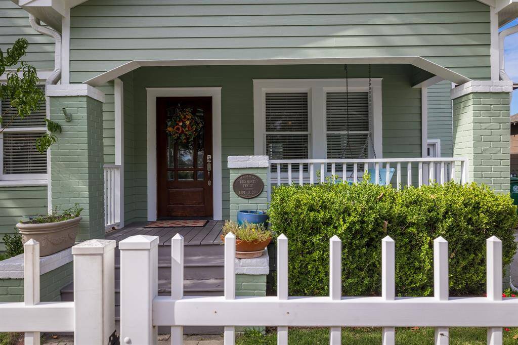 Side porch with swing just off Rural Street.