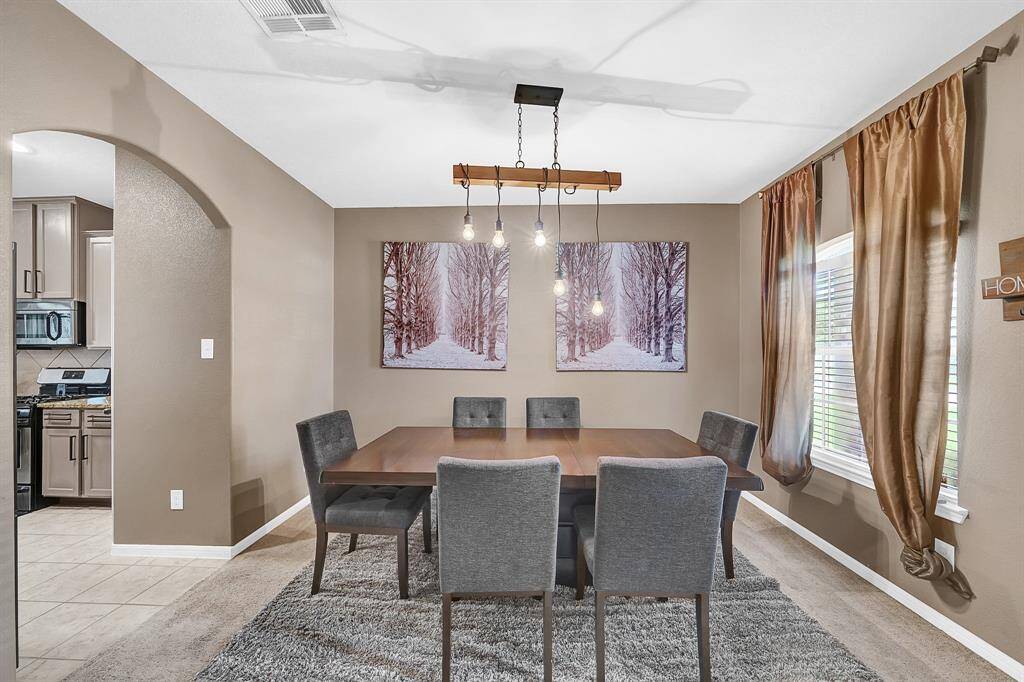 Another view of the formal dinning room