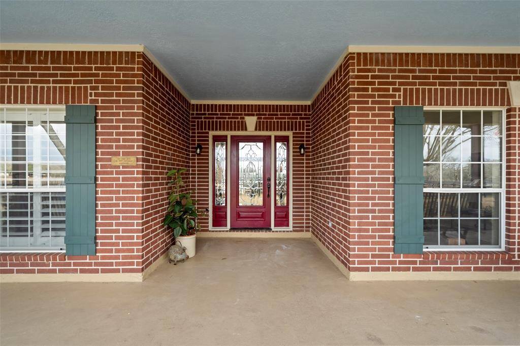 The large awning and front porch welcomes you to your new home!