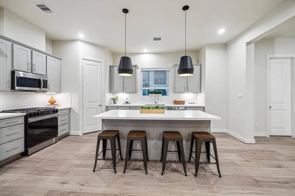 *Not of exact home, photo is of recently completed home in same community with same floor-plan & similar finishes*