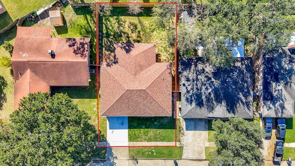 This aerial view showcases the INCREDIBLE 6,240 sqft lot.