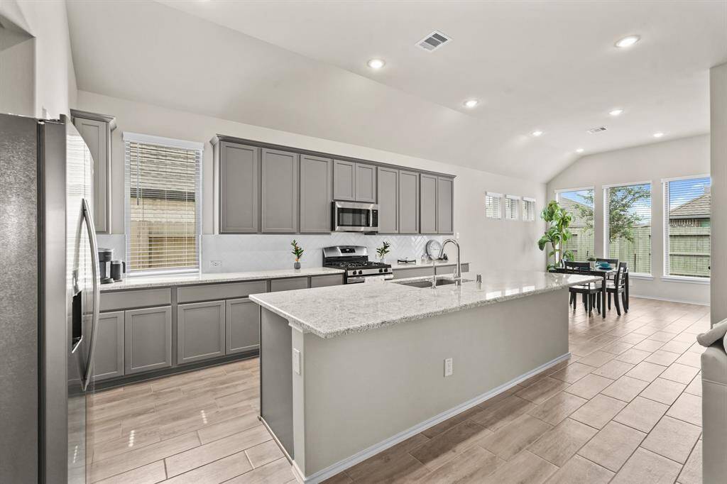 Oversized 10-ft. island, large enough to fit plenty of barstools!