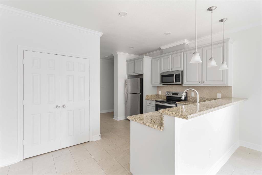 Double door pantry for extra storage.