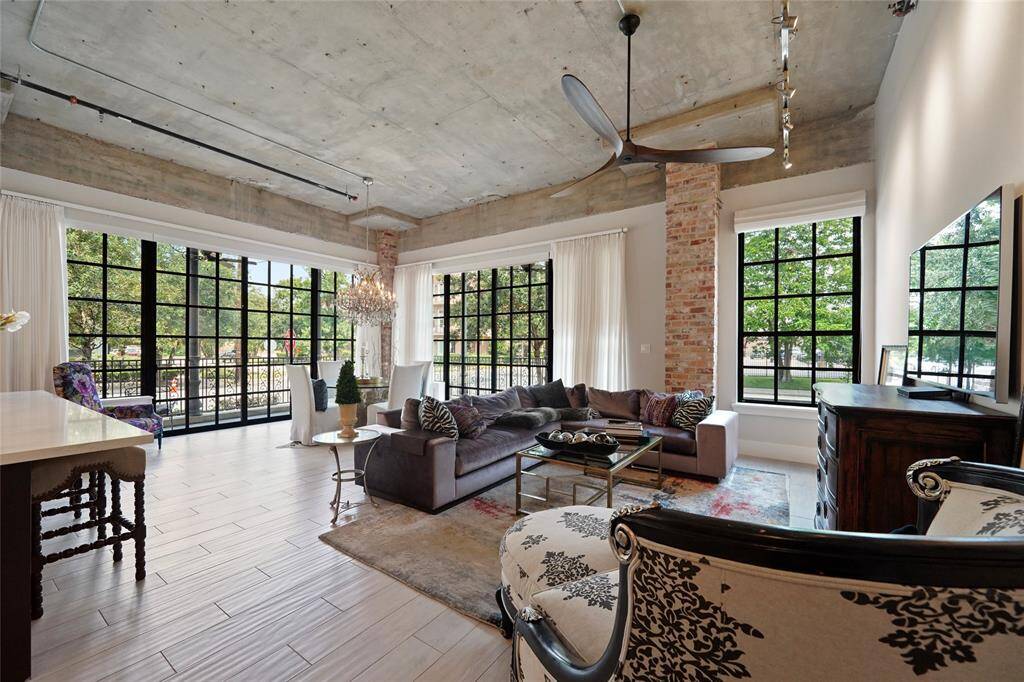 Q-Shades Roller Shades and Designer Custom Curtains in Living, Dining, and Kitchen areas
