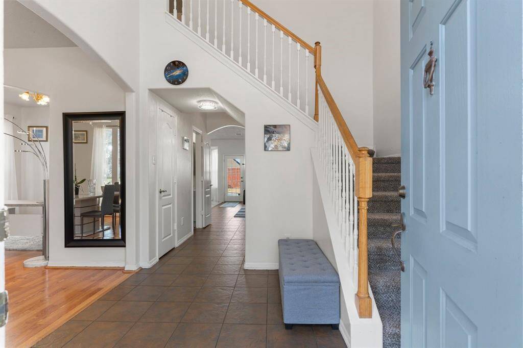 A breathtaking two-story entry that offers a stunning view of the pool!