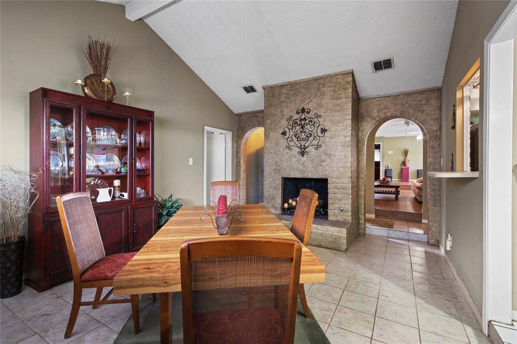 Another view of the formal dining room and fireplace